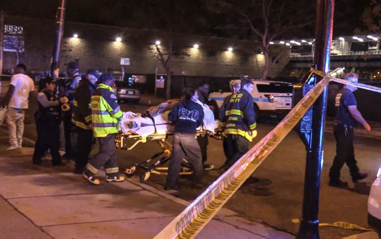 Police and fire personnel on the scene of a carjacking Tuesday at 1:43 am at 2201 S. Wabash Ave. A man was shot and his BMW was taken. | Network Video Productions