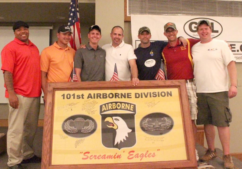Guns Save Life Executive Director John Boch, middle, with servicemen associated with the HOOAH program.